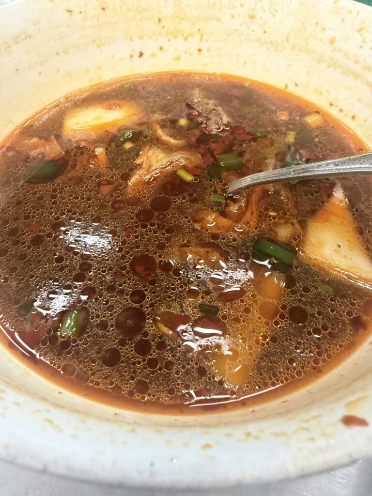 The color speaks for itself. Dangerously red, dangerously delicious. This is the broth that made me choke on the first sip.